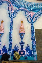 Идет ручная роспись декораций зимнего леса